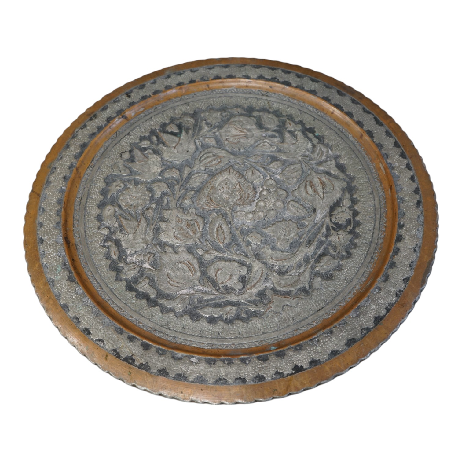 An Isfahan tinned copper tray, 59cm diameter. Condition - fair